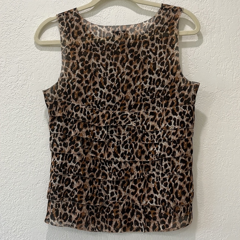Animal print tiered sleeveless top.